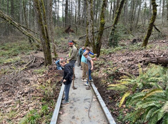 Everyone getting to work at the fiberglass boardwalk.