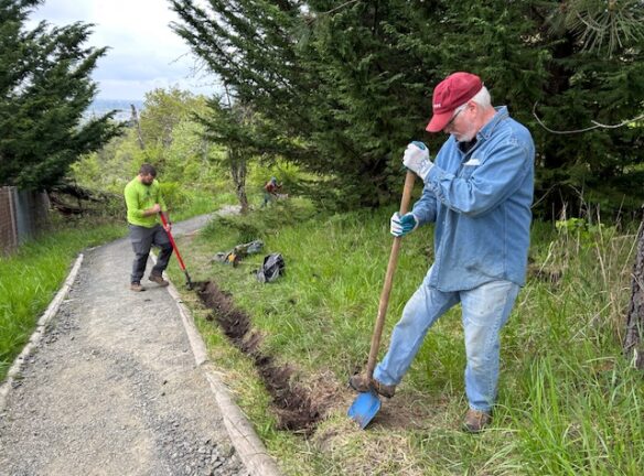 Dan and Matt ditch digging.