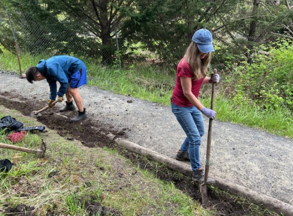 Sony and Teresa ditch digging.