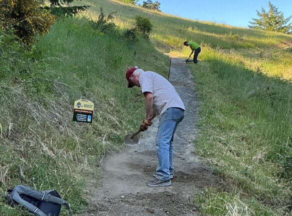 Dan and Matt hard at work chipping in drainage.